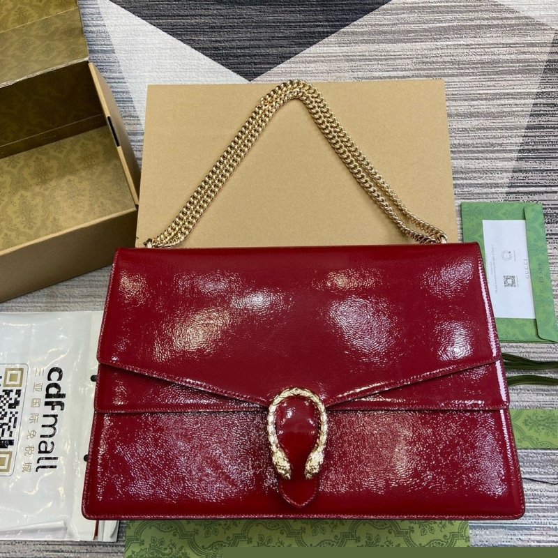 G*u*i top handle bags